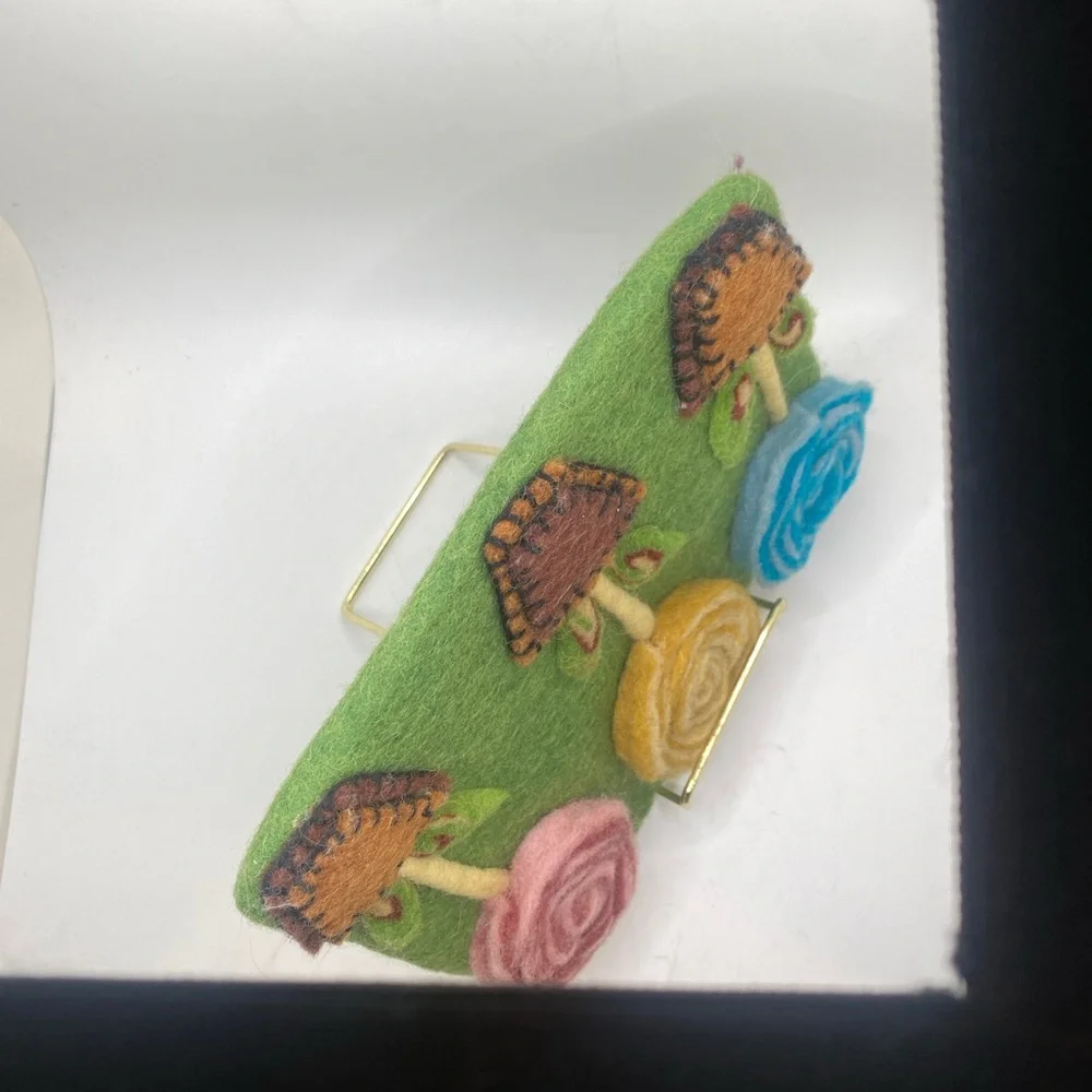Rising Tide clutch bag handmade, felted wool pouch featuring a floral design - Picture 5 of 10